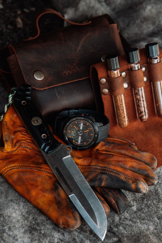 Leather bag, gloves, and pocket knife everyday carry gear
