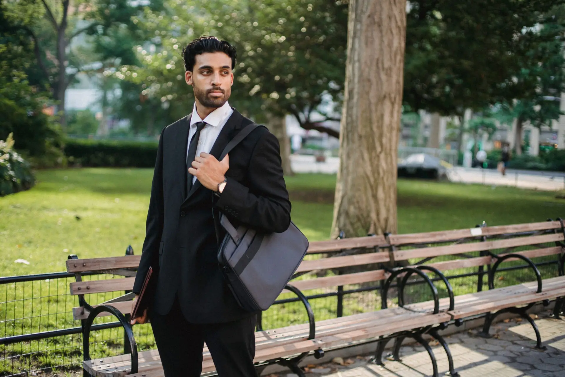 Business professional in a suit, representing concealment under professional attire